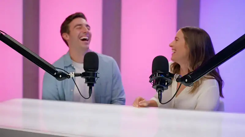 Podcast hosts recording a sponsored interview segment
